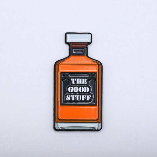 golf ball marker with whiskey design