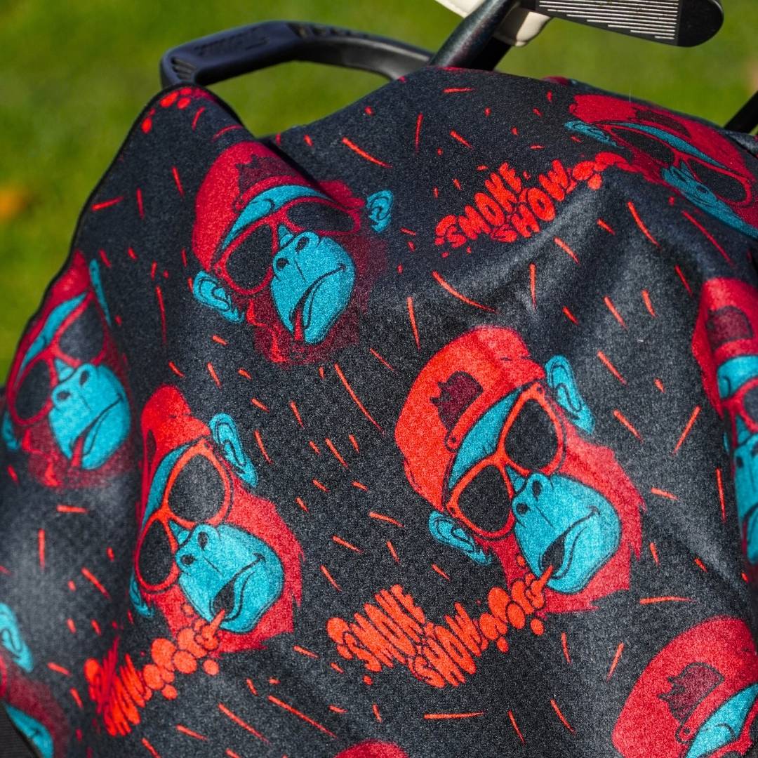 Close up of golf towel with Gorilla smoking