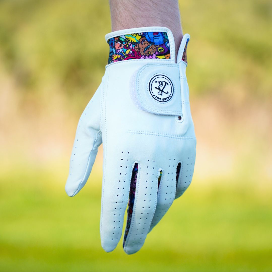 white golf glove hanging down with cool design on the wrist