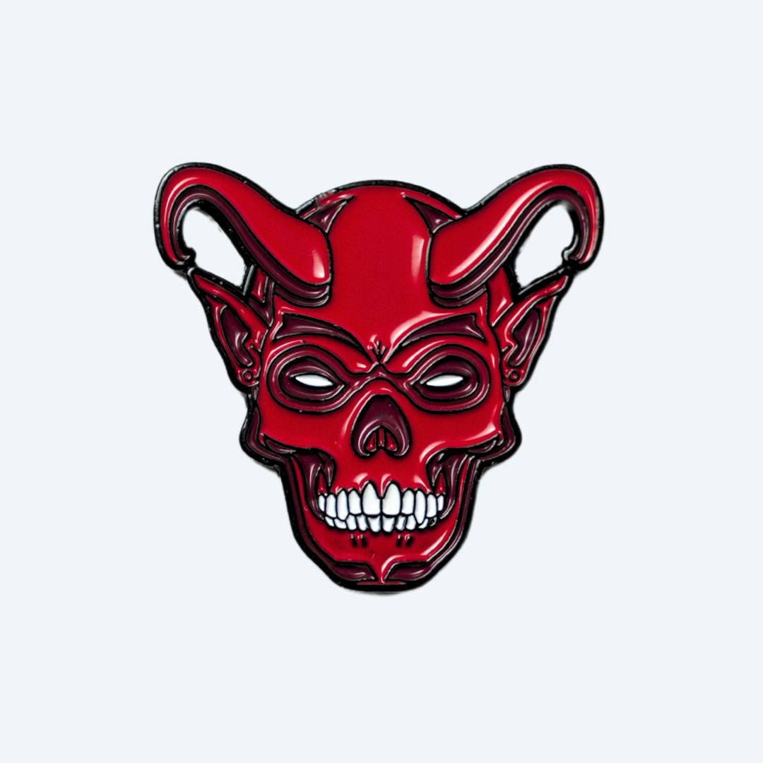 golf ball marker with devil design