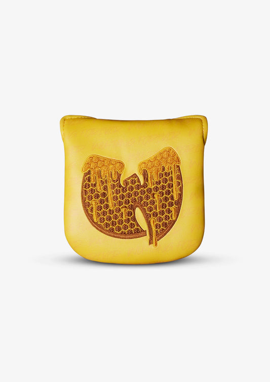 A yellow golf mallet headcover featuring an embossed honeycomb-style Wu-Tang Clan 'W' logo on the front, set against a plain light gray background.
