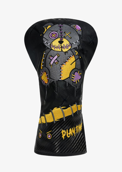 Golf club head cover with voodoo bear design on a white background