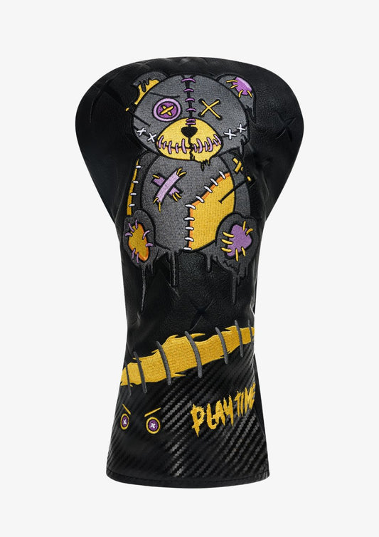Golf club head cover with voodoo bear design on a white background